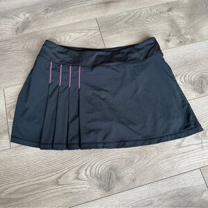 ATHLETA Black Skort SECOND WIND Pleated Tennis Running Golf Skirt Back Pocket